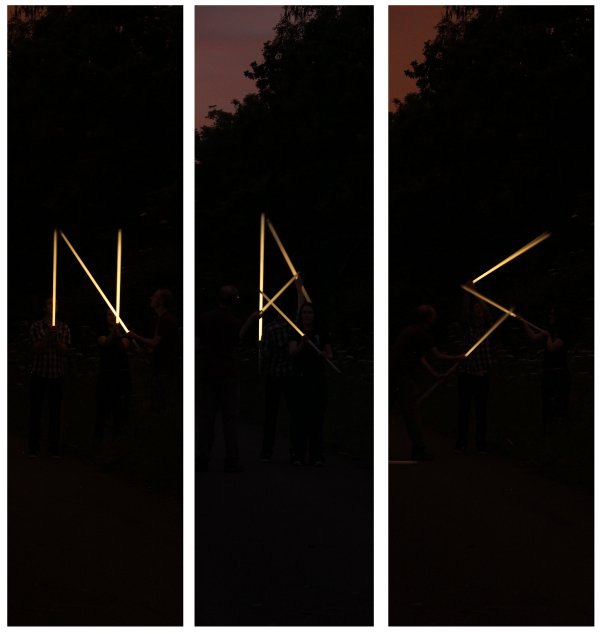 Letters constructed from glowing tubes